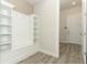Bright entry with built-in bench and shelving at 3449 Michigan St, Lake Mary, FL 32746