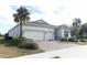 Two-car garage and well maintained landscaping at 3449 Michigan St, Lake Mary, FL 32746