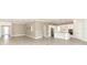 Open concept kitchen with white cabinets and island at 3449 Michigan St, Lake Mary, FL 32746