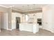 Modern kitchen with white cabinets and center island at 3449 Michigan St, Lake Mary, FL 32746