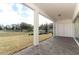 Spacious covered patio overlooking a large backyard at 3449 Michigan St, Lake Mary, FL 32746