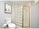 Updated bathroom with a glass block shower and colorful tile at 400 E Colonial Dr # 207, Orlando, FL 32803