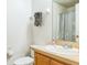 Bathroom with single sink vanity and shower at 8458 Secret Key Cove, Kissimmee, FL 34747