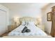 Bedroom with queen-size bed and nightstands at 8458 Secret Key Cove, Kissimmee, FL 34747