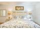 King-size bed with decorative pillows at 8458 Secret Key Cove, Kissimmee, FL 34747