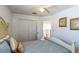 Relaxing bedroom with a queen bed and access to upper loft at 8458 Secret Key Cove, Kissimmee, FL 34747