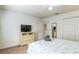 Bedroom with queen-size bed and access to loft at 8458 Secret Key Cove, Kissimmee, FL 34747