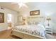 King-size bed, ensuite bathroom access at 8458 Secret Key Cove, Kissimmee, FL 34747