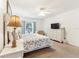 Spacious bedroom with king-size bed and TV at 8458 Secret Key Cove, Kissimmee, FL 34747