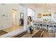 View of entryway, staircase, and access to the living and dining areas at 8458 Secret Key Cove, Kissimmee, FL 34747