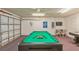 Well-lit game room with a pool table at 8458 Secret Key Cove, Kissimmee, FL 34747