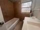 Bathroom with shower/tub and white sink at 100 S Ortman Dr, Orlando, FL 32805