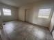 Simple bedroom with tile floors and window at 100 S Ortman Dr, Orlando, FL 32805