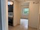 Hallway with bathroom and bedroom access at 100 S Ortman Dr, Orlando, FL 32805