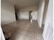 Spacious living area with tile flooring at 100 S Ortman Dr, Orlando, FL 32805