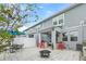 Outdoor patio with fire pit, seating area, and built-in grill at 12420 Turtle Grass Dr, Orlando, FL 32824