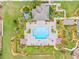 Community pool with surrounding patio and lounge areas at 12420 Turtle Grass Dr, Orlando, FL 32824