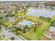 Aerial view of community pool and surrounding neighborhood at 12420 Turtle Grass Dr, Orlando, FL 32824