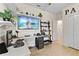 Home office features built-in shelving and a large workspace at 12420 Turtle Grass Dr, Orlando, FL 32824