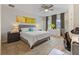 Spacious main bedroom with carpeted floors and home office at 12420 Turtle Grass Dr, Orlando, FL 32824