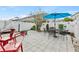 Relaxing patio with seating area and umbrella at 12420 Turtle Grass Dr, Orlando, FL 32824