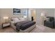 Bedroom with a queen-size bed and en-suite bathroom at 1245 Limbali St, Mount Dora, FL 32757