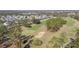 Golf course with homes in the background at 128 Higher Combe Dr, Davenport, FL 33897