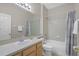 Clean bathroom with tub shower combo, vanity, and toilet at 128 Higher Combe Dr, Davenport, FL 33897