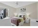 Bedroom with king-size bed and window at 128 Higher Combe Dr, Davenport, FL 33897