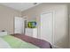 Bedroom with king-size bed and dresser at 128 Higher Combe Dr, Davenport, FL 33897