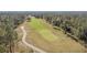 Aerial view of a lush golf course at 128 Higher Combe Dr, Davenport, FL 33897