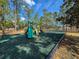 playground with slides and climbing equipment at 128 Higher Combe Dr, Davenport, FL 33897
