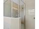 Walk-in shower with glass enclosure at 128 Higher Combe Dr, Davenport, FL 33897