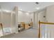 Upstairs study with built-in desk and two chairs at 128 Higher Combe Dr, Davenport, FL 33897