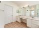 Bathroom boasts double vanity and tile floors at 1748 Golfview Dr, Kissimmee, FL 34746