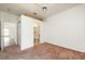 Bright bedroom with en-suite bathroom and carpet at 1748 Golfview Dr, Kissimmee, FL 34746
