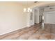 Bright dining room with tile floors and view to living room at 1748 Golfview Dr, Kissimmee, FL 34746