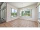 Bright dining room with tile floors and view of the pool at 1748 Golfview Dr, Kissimmee, FL 34746