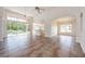 Spacious living room with tile floors and pool view at 1748 Golfview Dr, Kissimmee, FL 34746