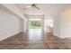 Bright and airy living room with access to the pool at 1748 Golfview Dr, Kissimmee, FL 34746