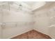 Large walk-in closet with ample shelving at 1748 Golfview Dr, Kissimmee, FL 34746