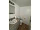 Small bathroom with toilet and sink at 2761 L B Mcleod Rd # C, Orlando, FL 32805