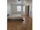 Spacious bedroom with tiled floors and window coverings at 2761 L B Mcleod Rd # C, Orlando, FL 32805