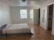 Spacious bedroom with tiled floors and window coverings at 2761 L B Mcleod Rd # C, Orlando, FL 32805