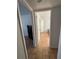 Bright hallway with tiled floors and access to bedrooms at 2761 L B Mcleod Rd # C, Orlando, FL 32805