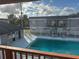 Community swimming pool with surrounding buildings at 2761 L B Mcleod Rd # C, Orlando, FL 32805