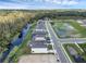 Row of houses next to a canal, offering serene waterfront living at 3019 Tackle Dr, Leesburg, FL 34748