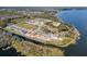 Community featuring lakefront homes and open green spaces at 3019 Tackle Dr, Leesburg, FL 34748