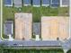 Aerial view showing new homes and several lots ready for construction at 3019 Tackle Dr, Leesburg, FL 34748