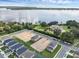 Aerial view of new homes under construction near a lake at 3019 Tackle Dr, Leesburg, FL 34748